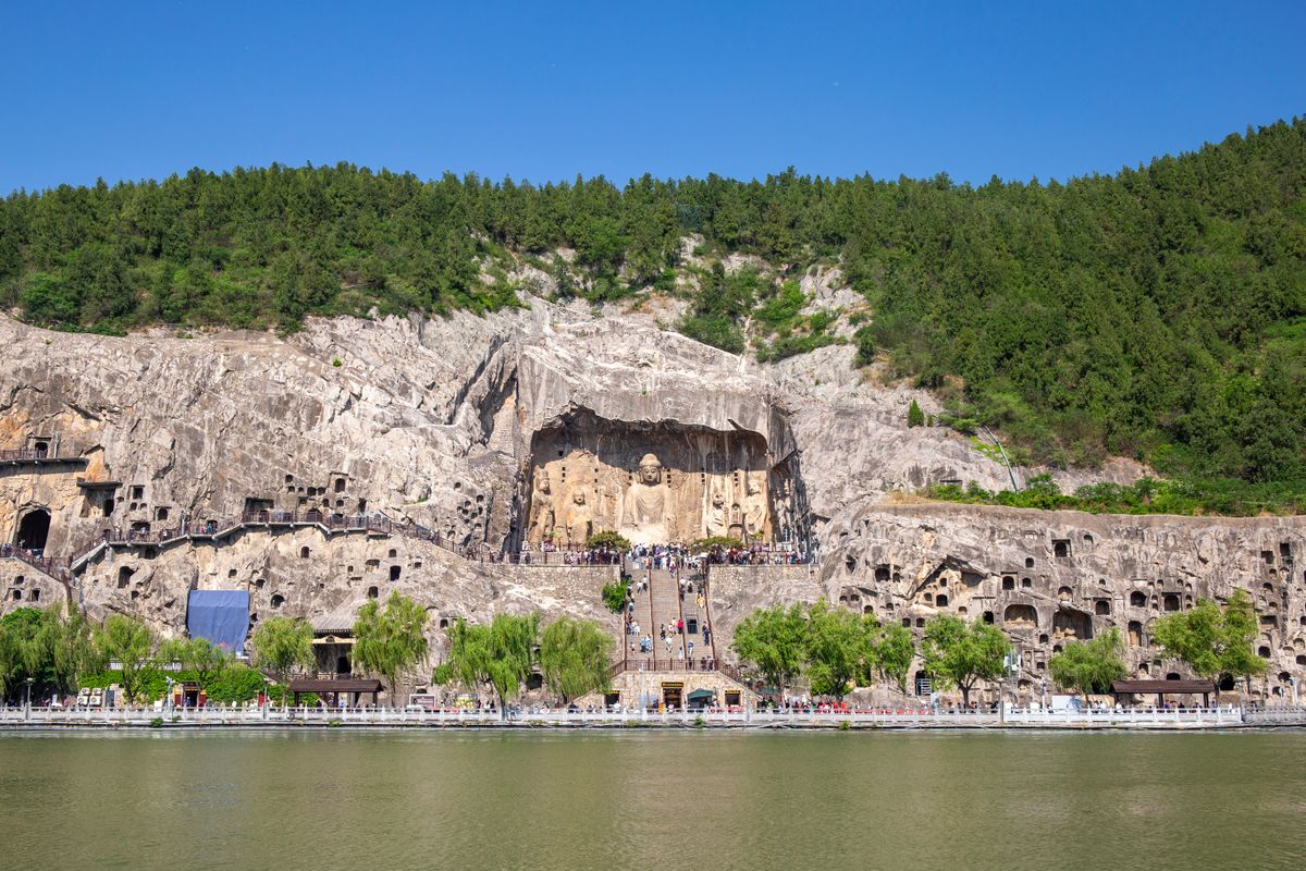 Longmen Grottoes cliff and river panorama for ancient capitals China tour