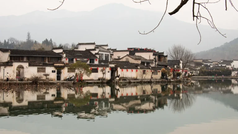 `Traditional village beside calm water in Huangshan, Anhui`